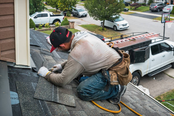 Professional Roofing technician working in Wayland, NY